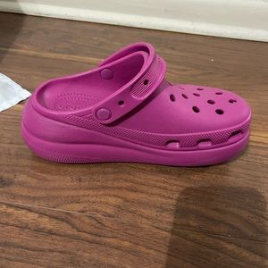 Crocs pink platform crush clogs size 7. Yellow pair is SOLD.